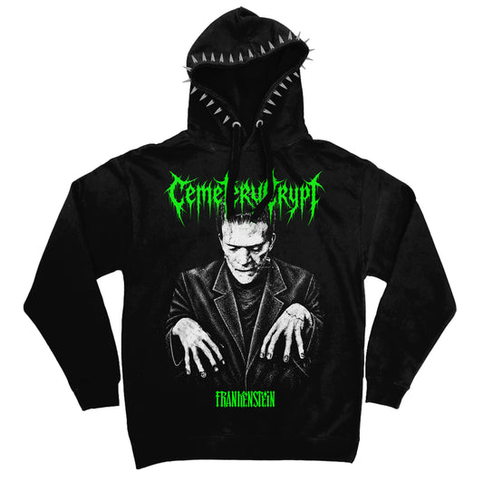 CemeteryCrypt Monster Hoodie in black featuring Frankenstein's monster, neon green gothic lettering and silver spikes around the hood