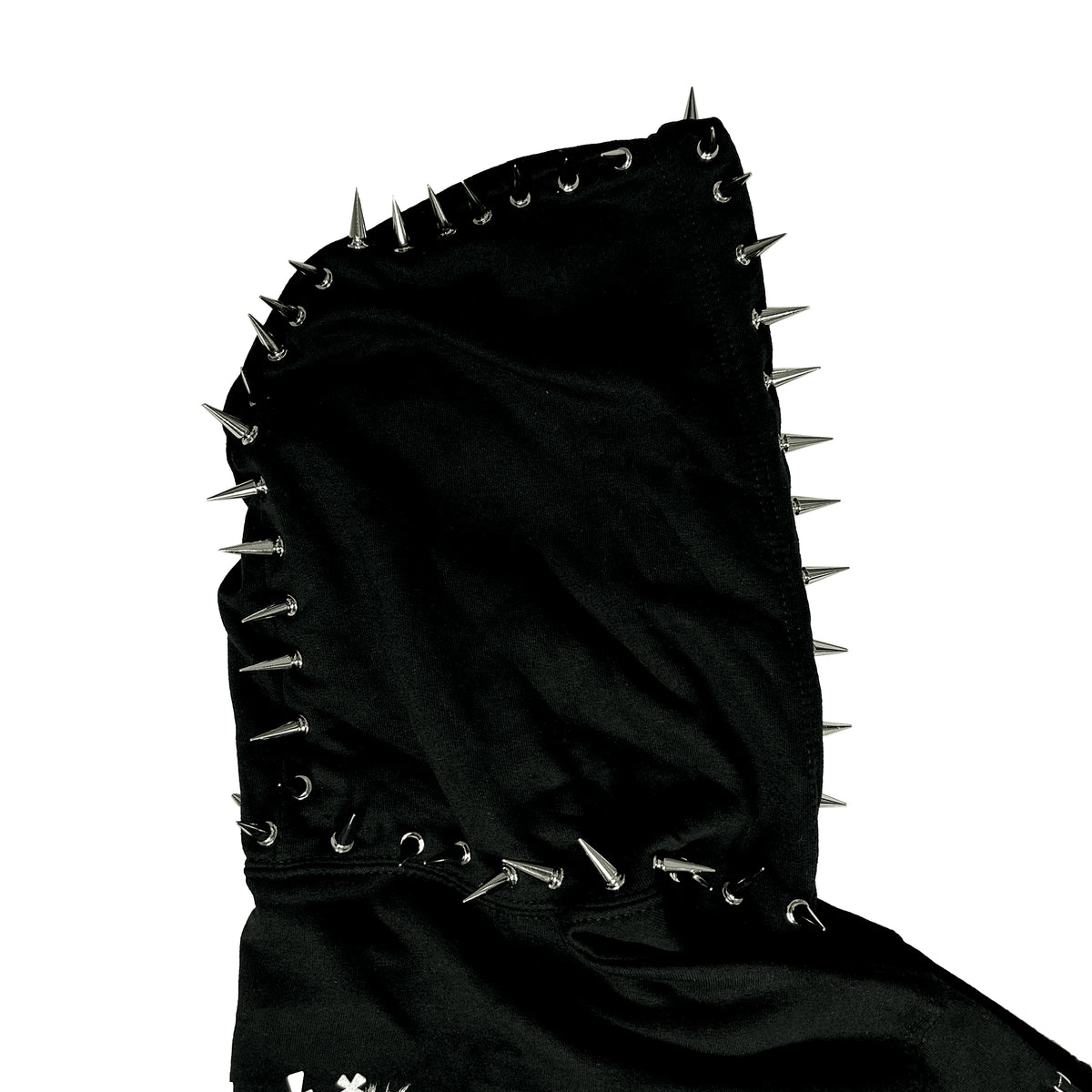 Side close-up of the Catacombs Hoodie hood showing silver spikes around its edge