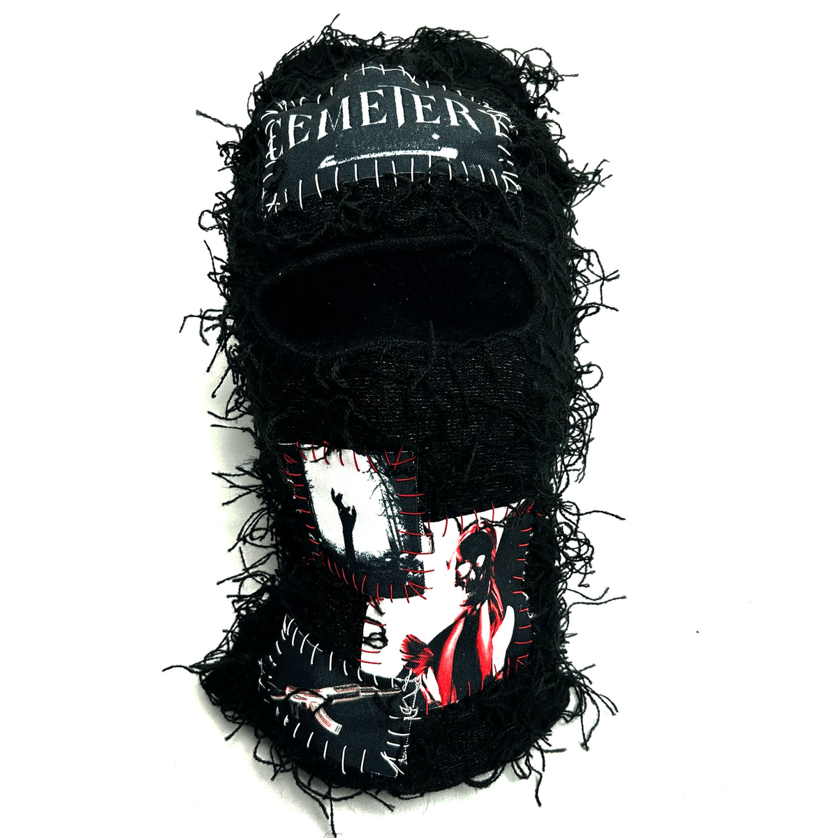 Front of the Cemetery Balaclava with frayed black fabric, white lettering and red-and-white graphic patches