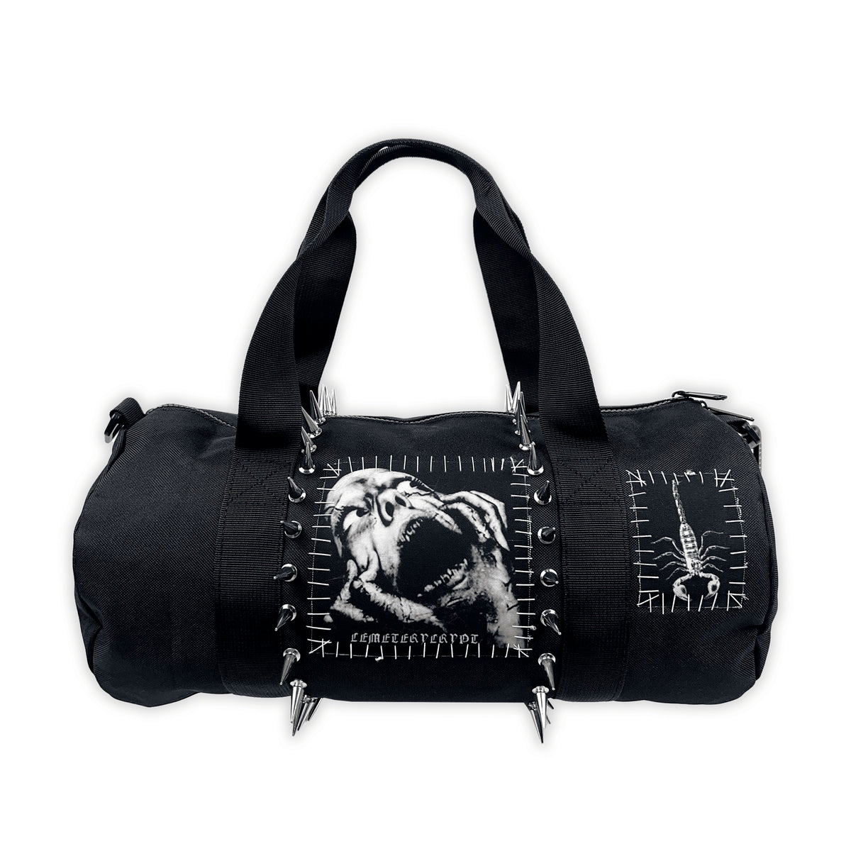 Front of the black Mini Terror Barrel Bag with a screaming-face patch, scorpion graphic and metal spikes