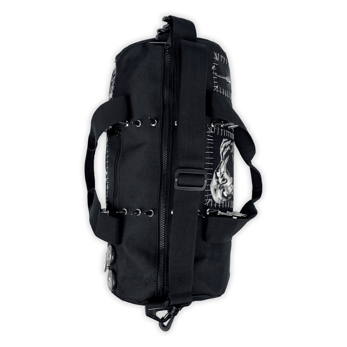 Bottom of the Mini Terror Barrel Bag showing its adjustable shoulder strap and handles