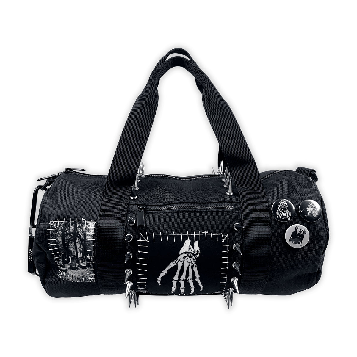 Reverse of the Mini Terror Barrel Bag with a skeletal-hand patch, stitched borders and round badges