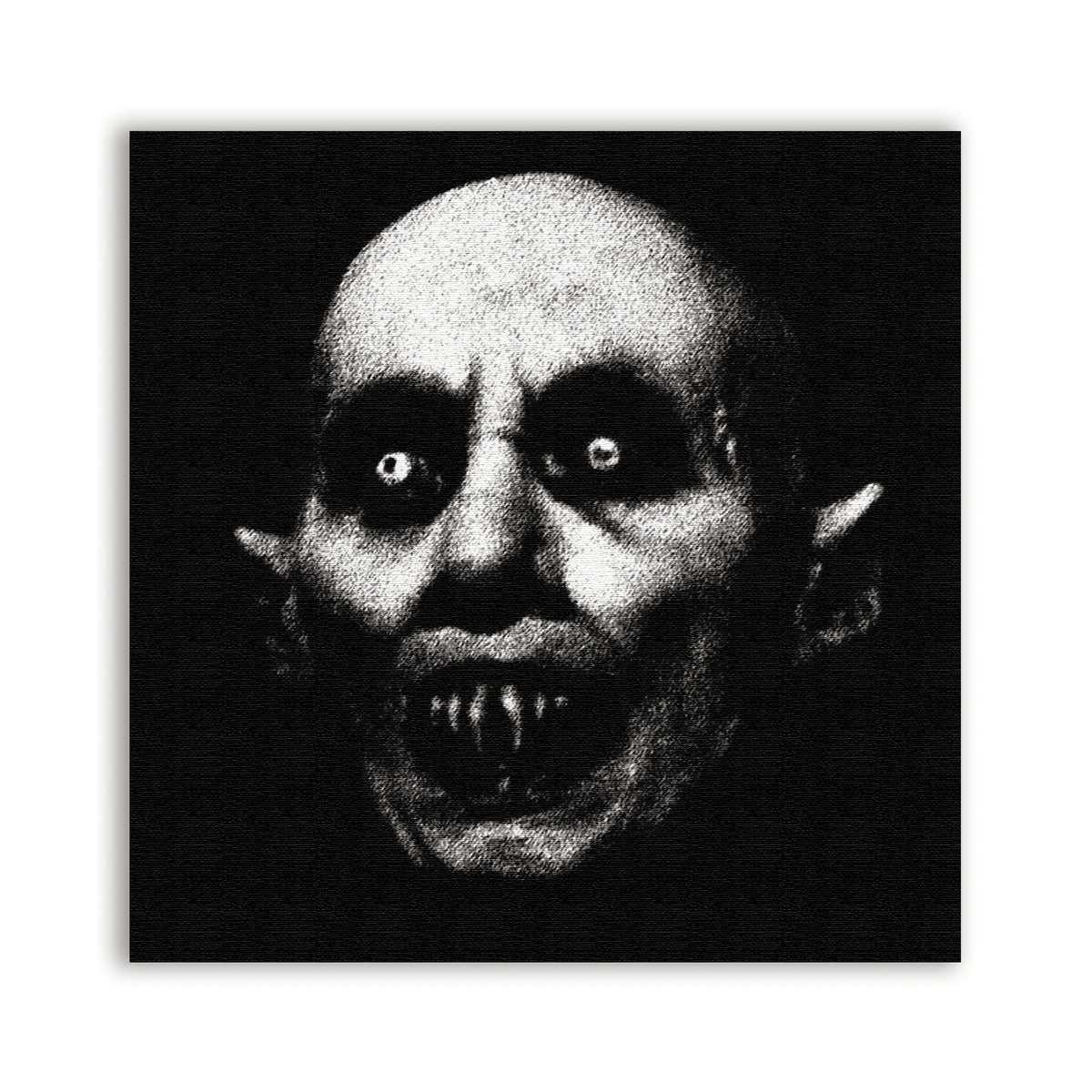 Nosferatu Fear Patch with a black and white close-up of a bald vampire face and sharp fangs