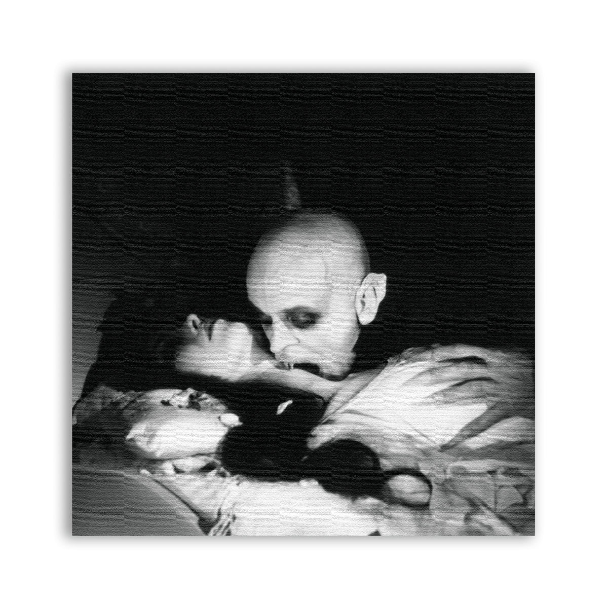 Nosferatu Girl Patch showing a bald vampire leaning over a reclining figure in black and white