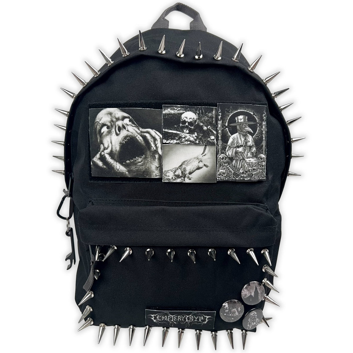 Closer front view of the Plague Spiked Backpack showing the patched panel, front pocket and rows of spikes